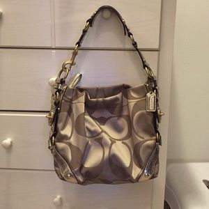 COPY - Tan/gold signature print coach purse & dust bag.